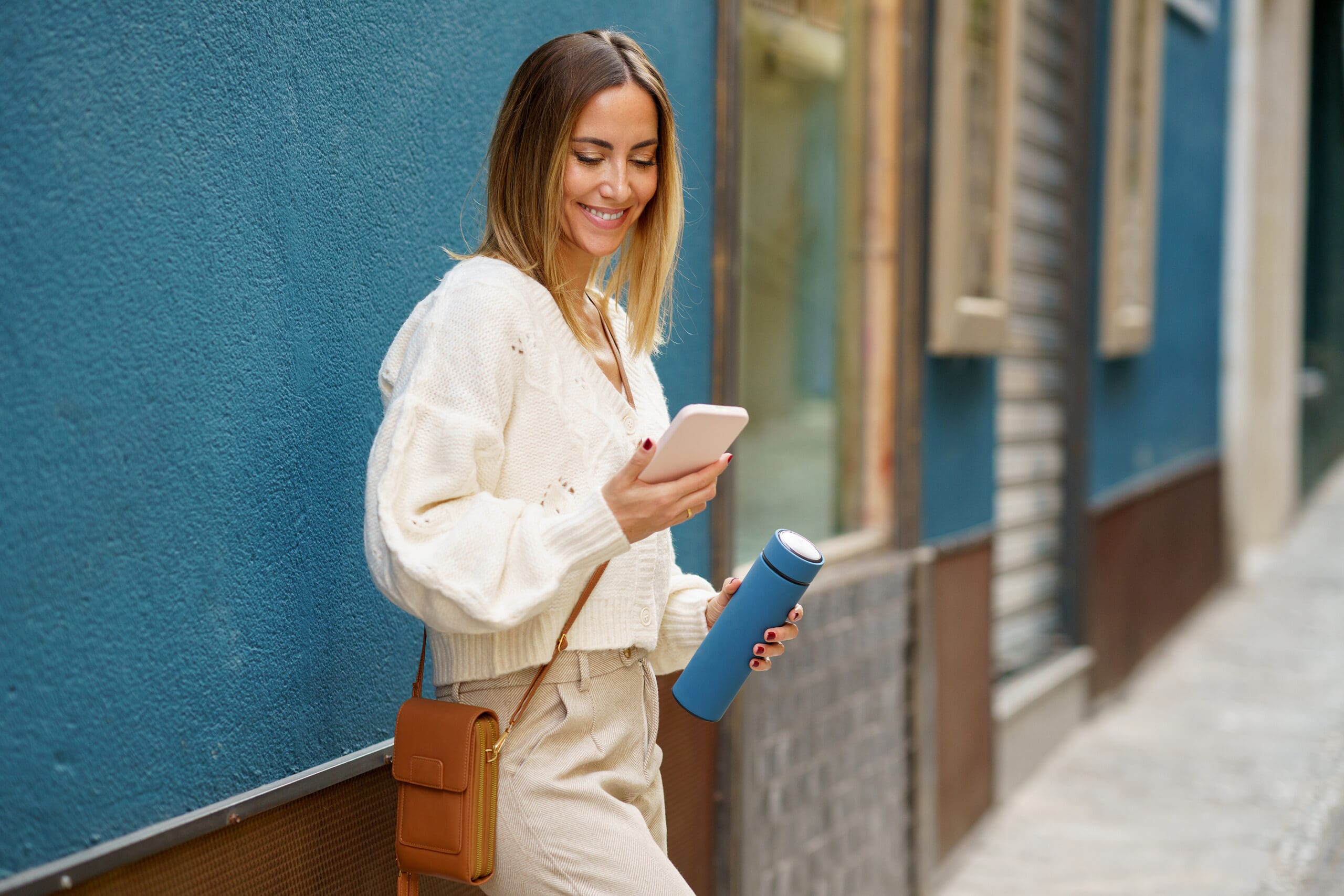 Why Do I Need an Ultrasound? A woman searching on her phone "Why Do I Need an Ultrasound?"